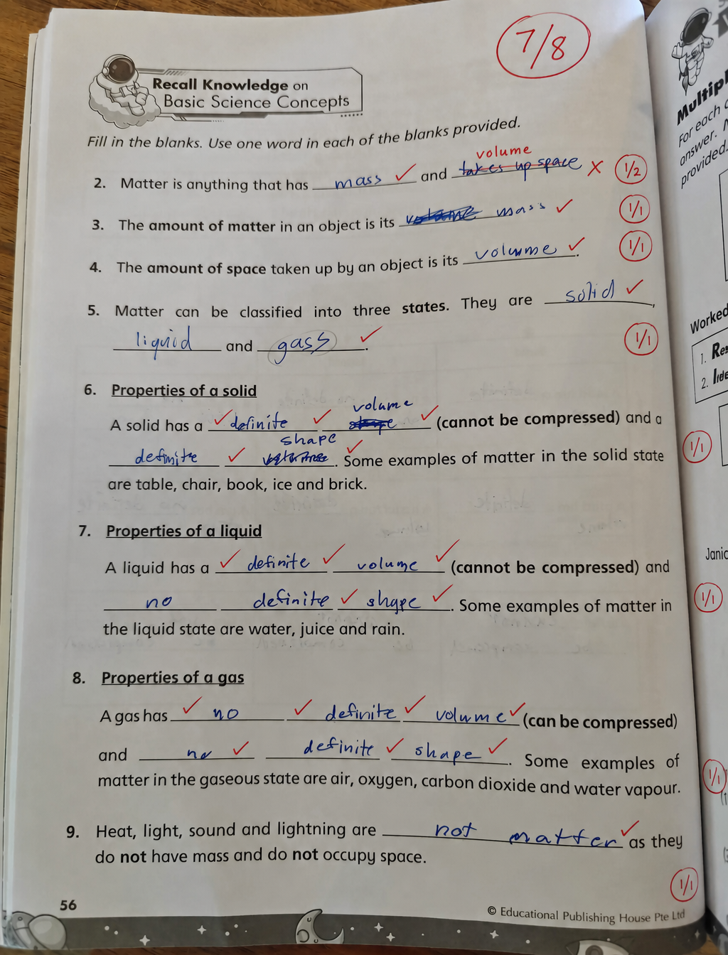 AI-marked student worksheet with red pen annotations and score 7/8